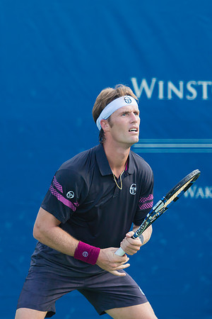 Daniel Gimeno-Traver waits for service at the Winston-Salem Open