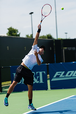 Jonathan Ho serves at the Winston-Salem Open