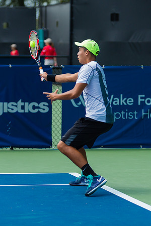 Jonathan Ho makes contact at the Winston-Salem Open
