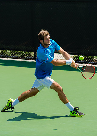 Keivon Tabrizi reaches for a return at the Winston-Salem Open