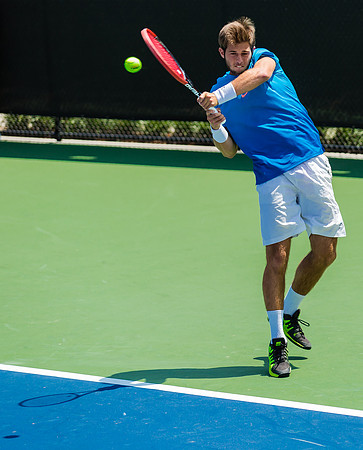 Keivon Tabrizi hits a return at the Winston-Salem Open