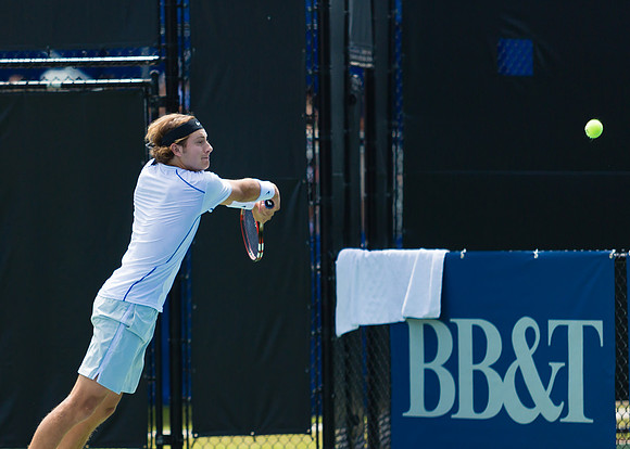 Brayden Schnur returns service at the Winston-Salem Open