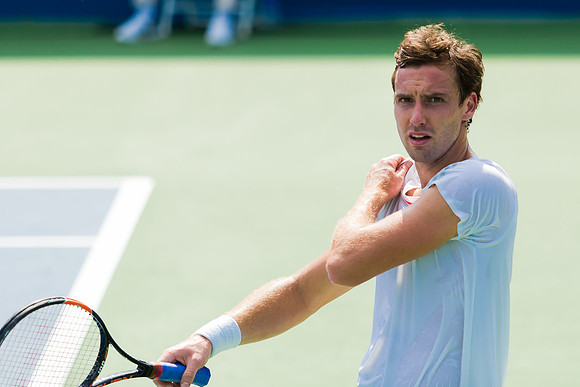 Ernests Gulbis between points at the Winston-Salem Open