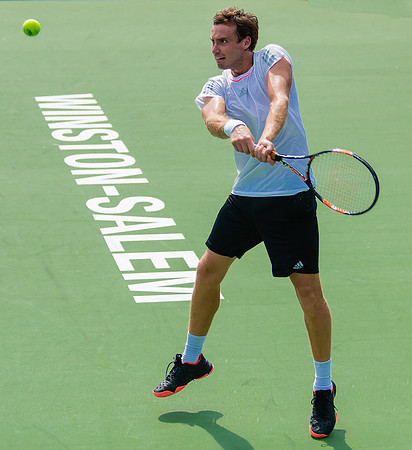 Ernests Gulbis hits in the backcourt at the Winston-Salem Open