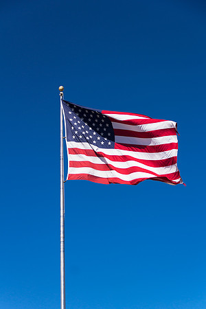 American Flag against blue sky
