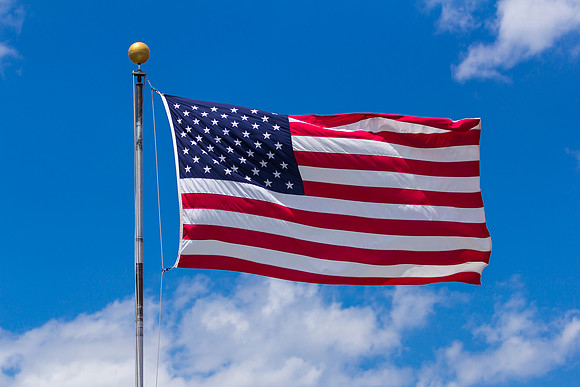 American Flag on Blue Sky