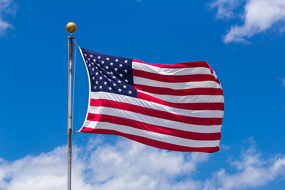 American Flag Against Blue Sky